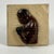 A rare and unique find, a Folk Art hand wood carving and miniature portrait of American boxer Joe Louis (1914-1981)....