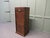 This is an attractive piece it has 8 sliding shelves The front of the Filing cabinet is good and free moving, the tambour...
