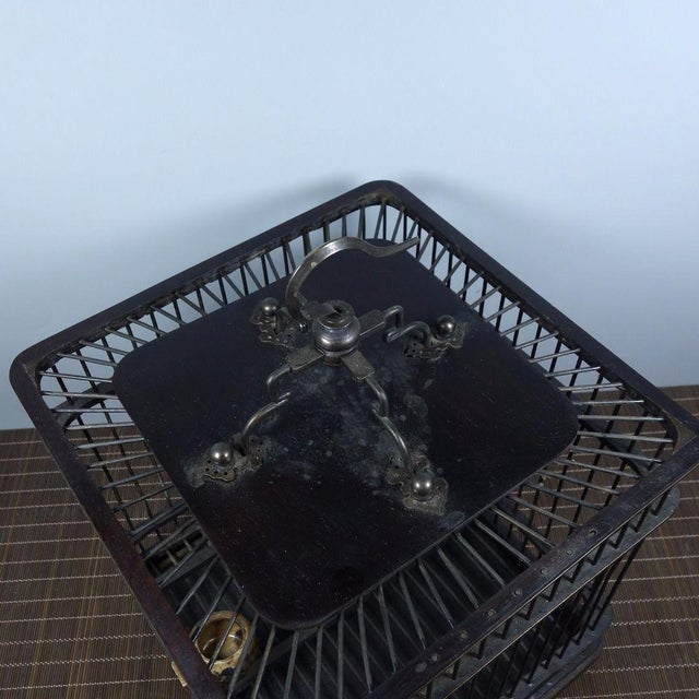 1980s Vintage Dark Wood Birdcage With Bronze Wire and Ceramic Feeders For Sale - Image 5 of 8
