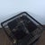 1980s Vintage Dark Wood Birdcage With Bronze Wire and Ceramic Feeders For Sale - Image 5 of 8