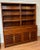This large mid-century Oriental George Zee Company-made in the 1960s hand-carved solid rosewood bookcase display cabinet...
