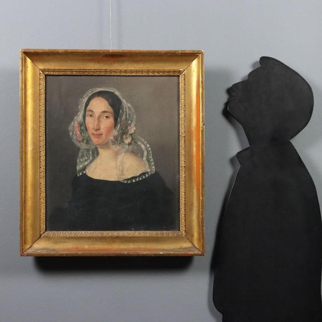 Oil on canvas. Lombard school, mid-19th century. The white lace veil, embellished with small flowers, stands out in this...