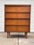 Made by Ward Furniture, a beautiful four drawer chest of drawers from the mid-20th century. Features slanted front drawers...