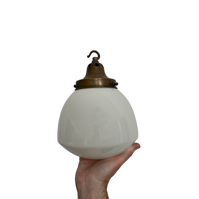 - A small church opaline ceiling pendant, England circa 1930. - Beautiful oval shape to the opaline glass which is held in...