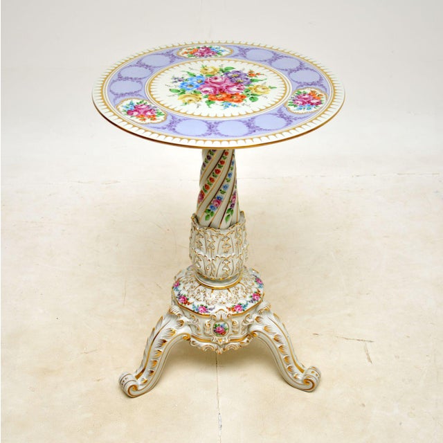A stunning antique Dresden style porcelain occasional table. This was made in Germany by Von Schierholz, it dates from...