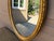 Early 20th Century Adam Style Neoclassical Giltwood Oval Mirror With Urn Crest For Sale - Image 13 of 17