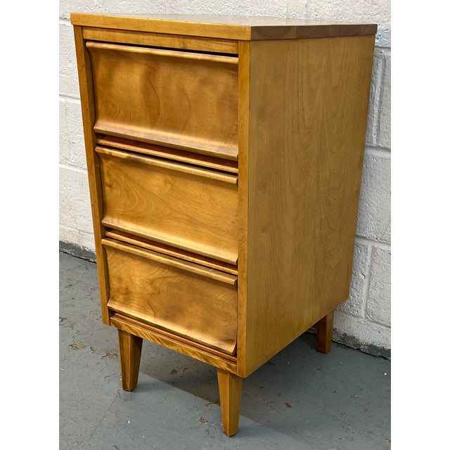Bring authentic mid-century character into your space with this vintage nightstand by Morris of California, crafted in the...