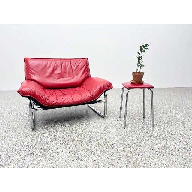 An iconic vintage armchair from ikea's exclusive 1970s collection, designed by johan bertil häggström. This red leather...