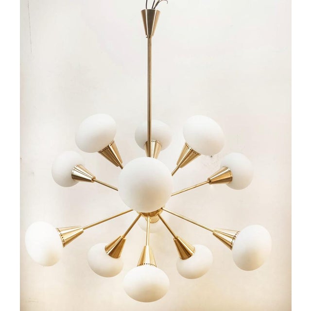 Sputnik 12-Light Chandelier in Brass and Glass, in Very Good conditions. Designed 1970 to 1979 Up to 250V (Europe/UK...