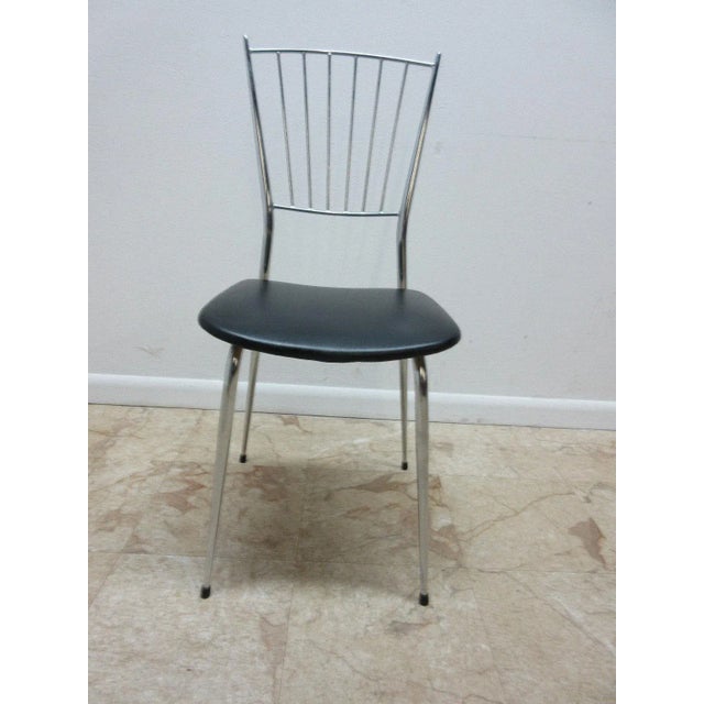 A Mid-Century Gio Ponti chair. Measurements ( l x w x h) 16 x 14.5 X 34.5 Seat height 18.. Great shape. Tight and sturdy.....