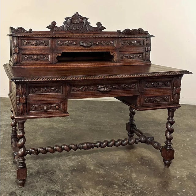 19th Century French Renaissance Hand-Carved Wall Desk is a remarkable testament to the craftsmanship of artisans from the...