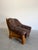 Vintage 1970’s Belgian Brutalist Oak and Brown Leather Lounge Chair, maker unknown. Solid oak frame with paneled sides and...