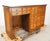 Early 20th century Industrial style medium toned wood office desk with plenty of storage. Twenty pull out drawers, each...