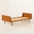 This Danish single teak bed was made in the 1960s. Crafted from solid teak and teak veneer, it embodies warmth, precision,...