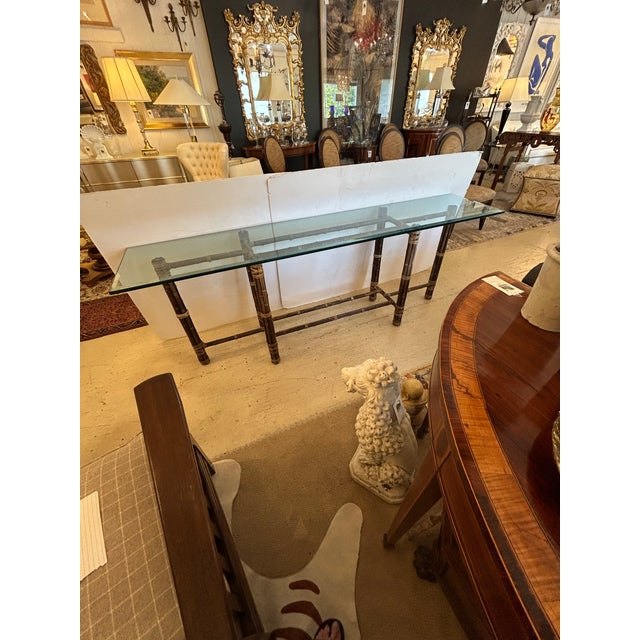 Stunning narrow and quite long natural dark stained bamboo console having .75 thick beveled top. Handsome and elegant.