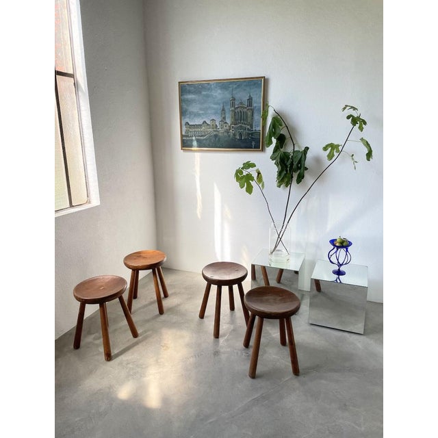 Set of 4 solid pine stools, with their round curved seat and beautifully hammered wooden base. with their graphic,...
