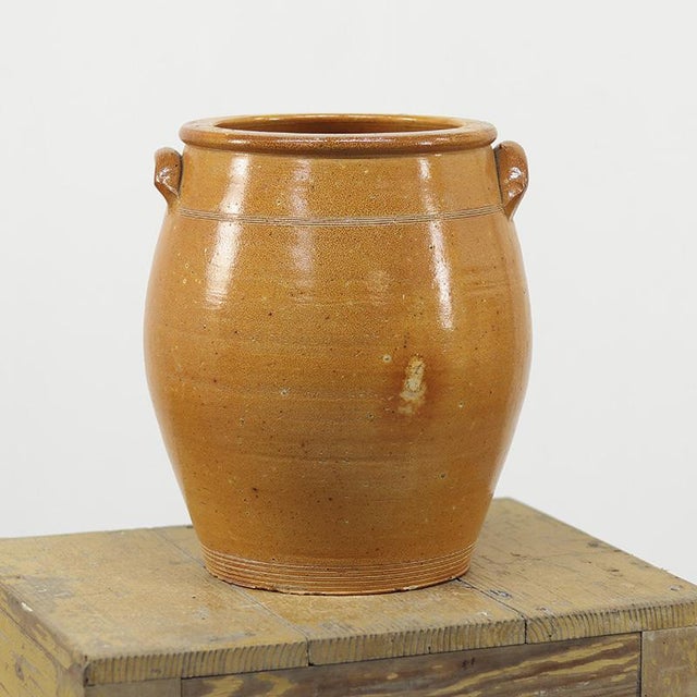 This beautiful earthenware storage jar dates from the early 20th century and was used at the time for preserving and...
