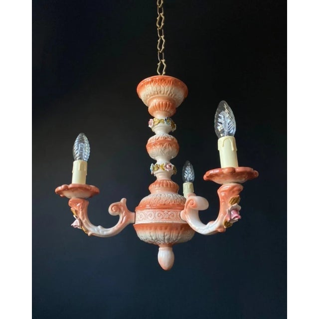 Available 2 pieces, Beautiful elegant chandelier in a delicate peach colour. The chandelier is made of ceramic. Decorated...