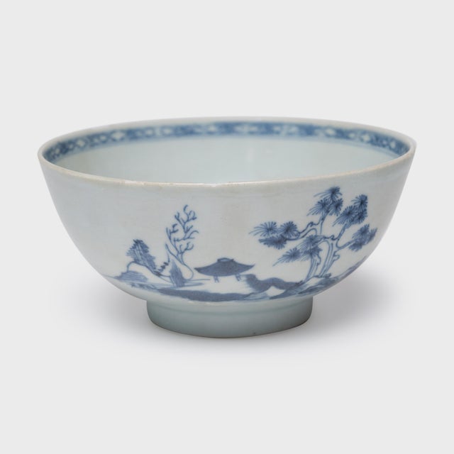 Softened by seawater, this blue-and-white porcelain bowl spent 250 years submerged in the salty waters of the South China...