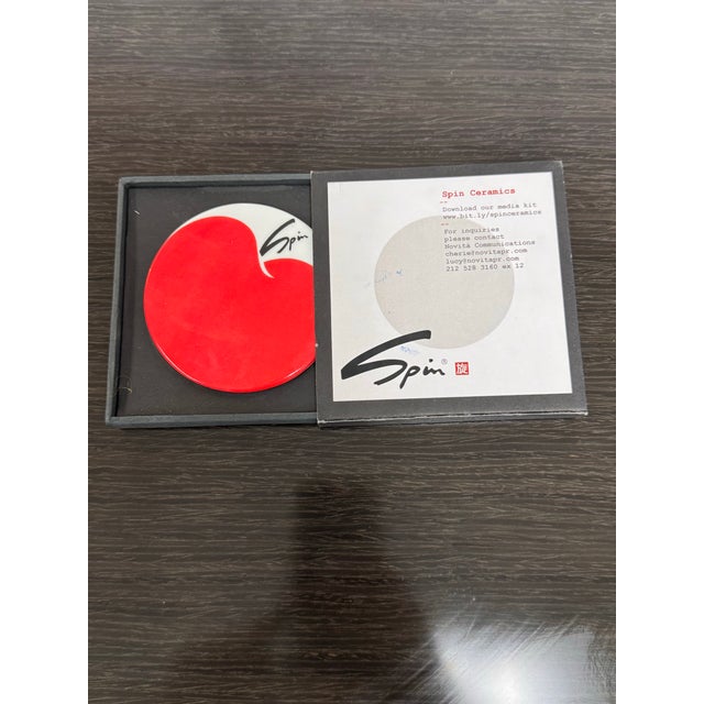 Design Plus Gallery presents a Chinese Porcelain Coaster by Spin Ceramics. The round porcelain form has a glossy red...