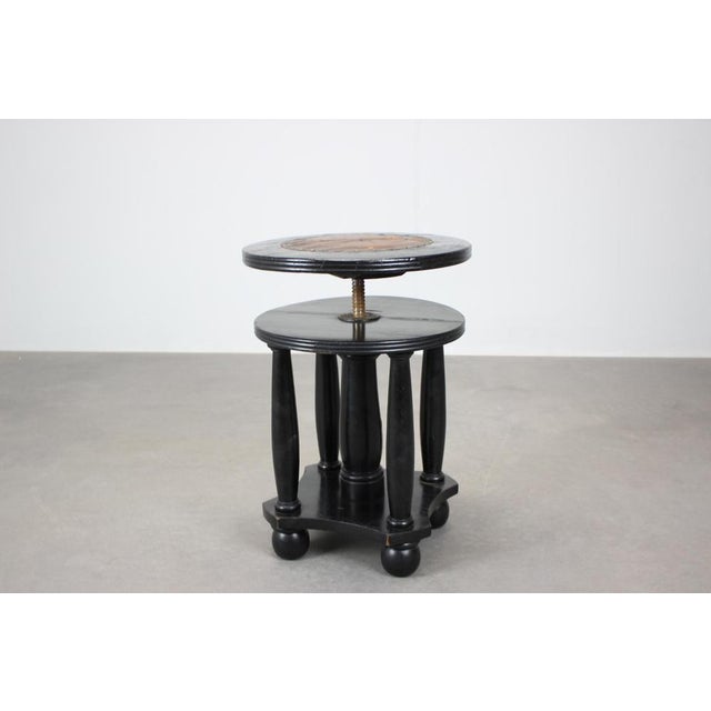 Antique piano stool crafted in Central Europe in the early 20th century. The piece features a classic turned wood base...