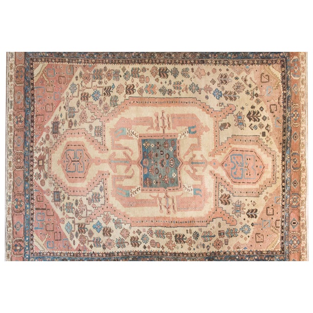 An extraordinary late 19th-century Persian Bakhshaish Serapi rug, woven with an incredible balance of tribal artistry and...
