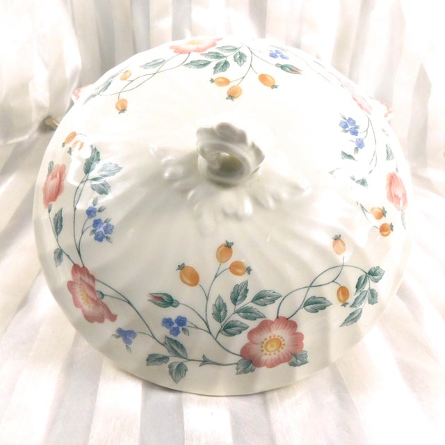 This is a Churchill round covered vegetable serving dish in the Briar Rose pattern from 1993. The bowl is beige color with...