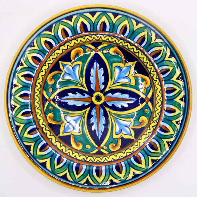 Add a touch of authentic Umbrian craftsmanship to your home with this beautiful, hand-painted majolica ceramic plate from...