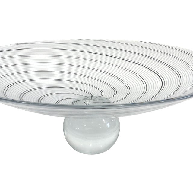The Spiral Stripe Palace Footed Bowl by Global Views is a large-scale decorative centerpiece measuring 7.5"H x 21"Dia.....