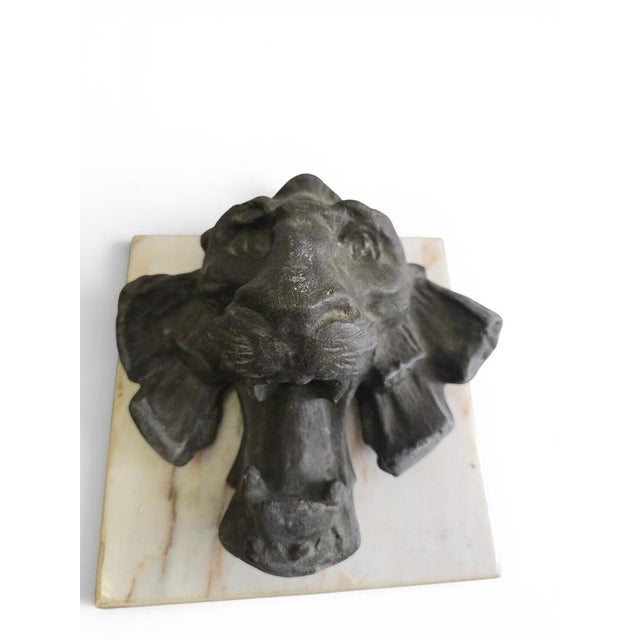 Decorative lion head relief crafted in resin during the 1970s, inspired by the architectural ornaments and mascarons that...