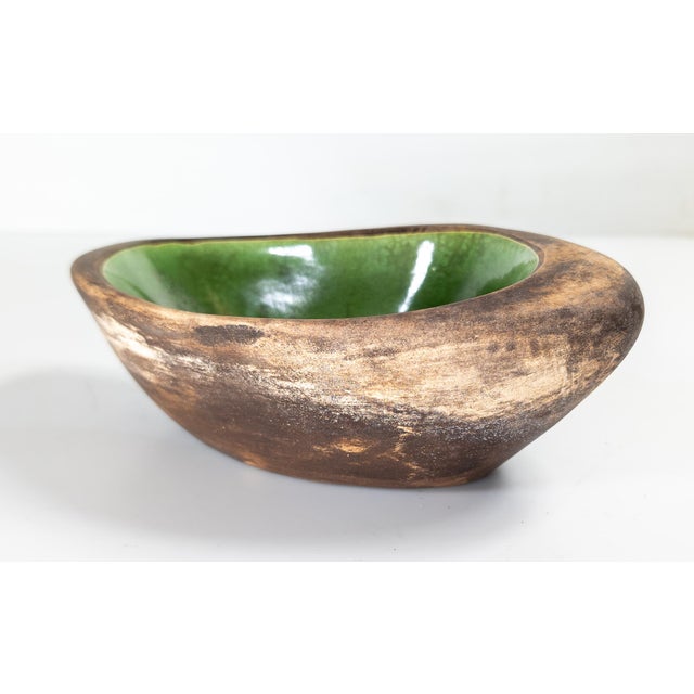 We are selling this cool Mid-Century Modern art pottery bowl. This bowl has interesting green glaze on the interior with...