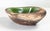 We are selling this cool Mid-Century Modern art pottery bowl. This bowl has interesting green glaze on the interior with...