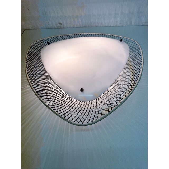 Ceiling lamp from the 1950s, two-bulb, E27 sockets Black lacquered metal grille, white acrylic glass. Good used condition....