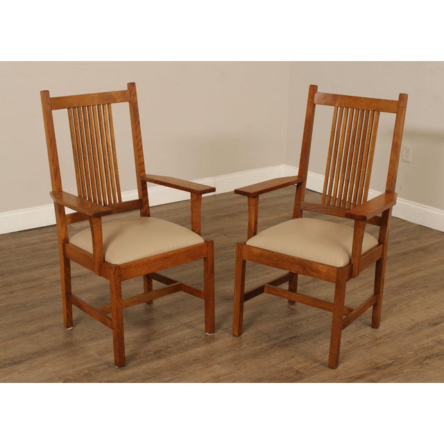 High Quality American Made Pair of Oak Armchairs With Vinyl Upholstered Seats and Spindled Backrests