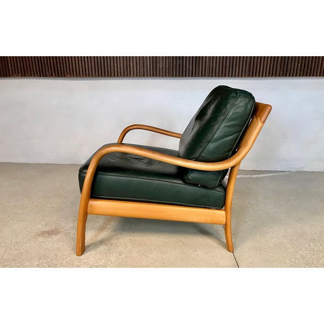 This large high-quality lounge chair was manufactured by Komfort in Denmark during the 1970s. Its frame is made from...