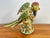 Chinese Export porcelain green and blue majolica-style parrot lifting off a wood stump. Beautiful details and colors. Most...