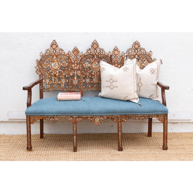 This exquisite antique Inlay settee is a breathtaking example of 19th-century Damascus craftsmanship. The frame is...