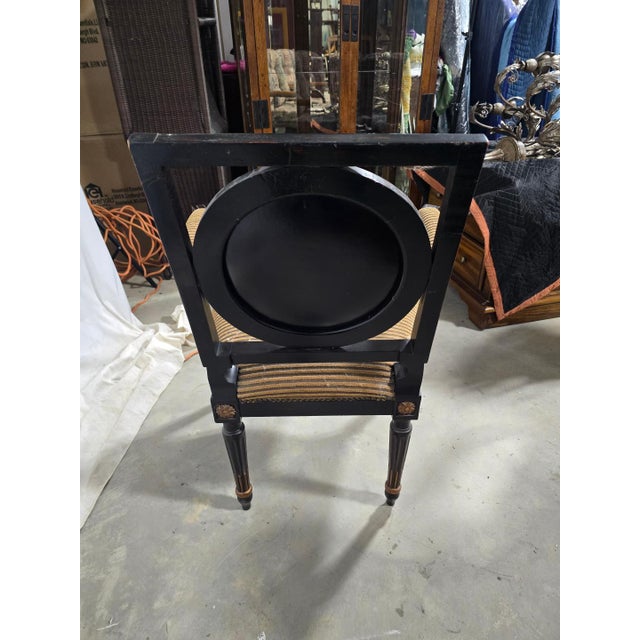 This is a unique decorative accent arm chair featuring an integrated clock-style backrest, designed as a statement or...