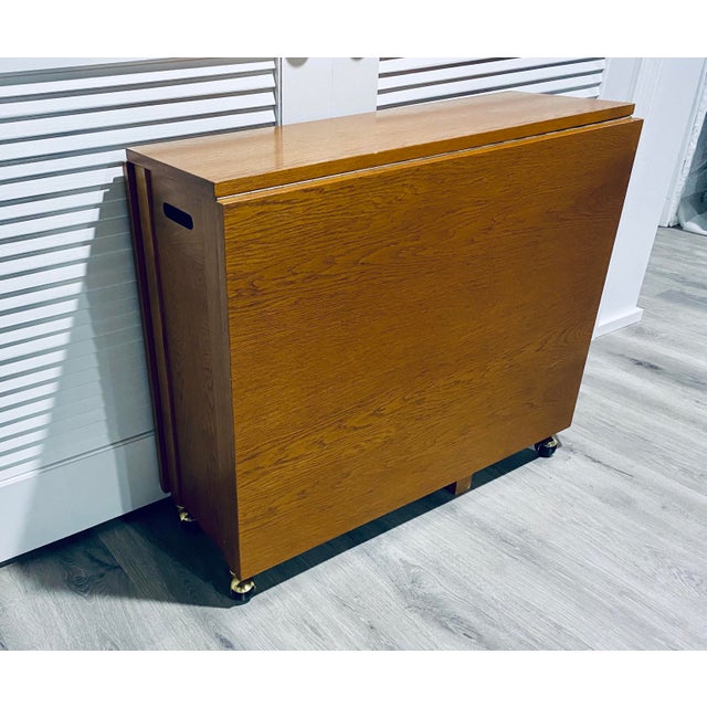 Vintage MidCentury DropLeaf Table on Casters With 4 Hideaway Chairs