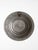 Vintage embossed tinned copper wall plate with fluted rim, geometric repoussé detailing, and central elephant medallion....