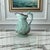 A rare-color example of an antique Ridgway relief-molded pitcher (Staffordshire, c. 1845–1860), finished in an...