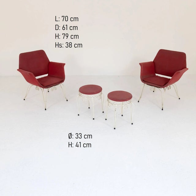 Pair of armchairs and related footrest pouf from the 1950s with wrought and painted iron structure and seat in original...