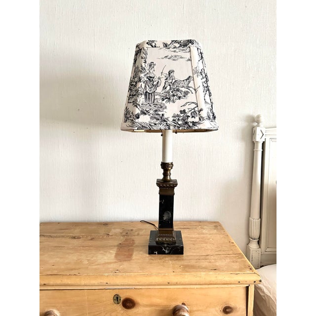 Heavy vintage candlestick style lamp made from black marble and antique brass Ornate classic details in the brass with...