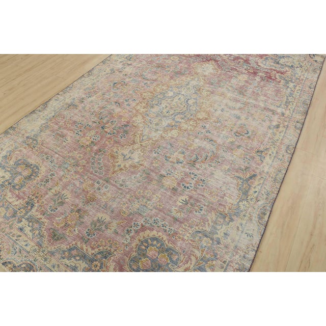 An authentic vintage traditional Kerman rug hand-knotted with fine wool and natural dyes. This oriental rug features a...