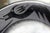 Black on black San Ildefonso pottery plate.with encircling serpent. Very traditional design. Signed on reverse Marie and...