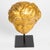 A gilded wooden sculpture of a cherub’s head from the 17th or 18th century. A sculpture of an angel’s head in the italian...