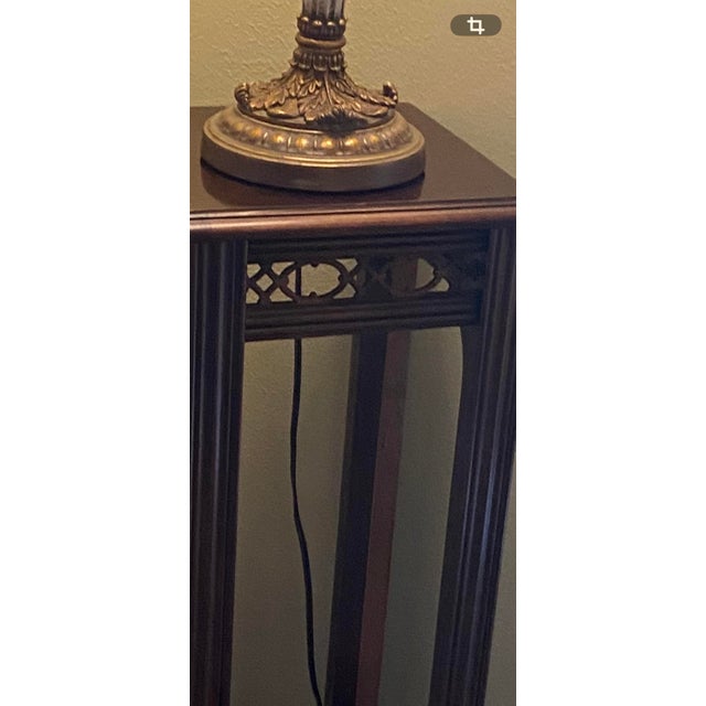 Add a touch of classic sophistication to any corner with this elegant vintage wooden pedestal stand. Perfect for...