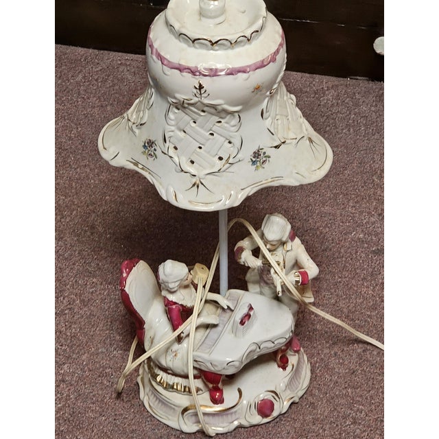 Vintage Porcelain Courting Couple Lamps This is a vintage Victorian-style porcelain lamp featuring a courting couple...