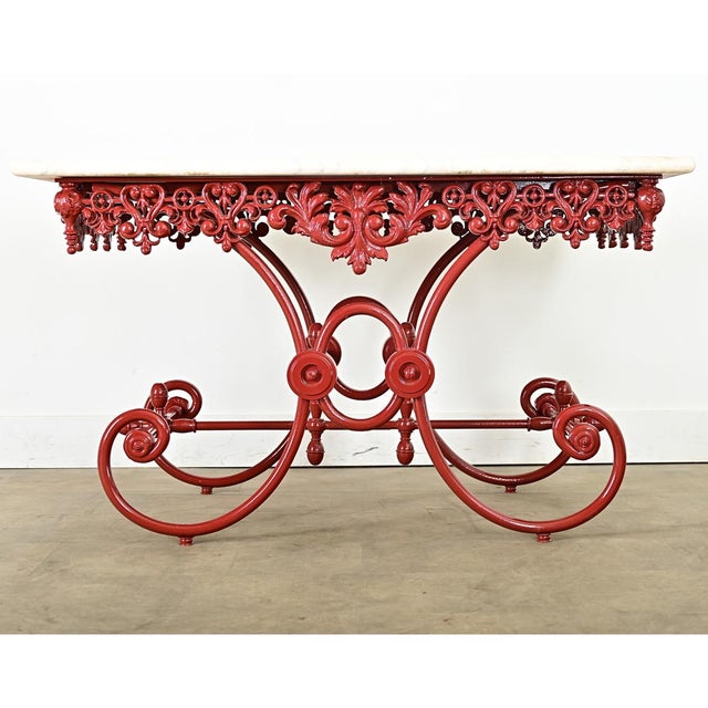 A dramatic French marble and iron work table from the 19th century, that would have been a display fixture in a butcher...
