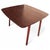 This vintage drop-leaf table offers a timeless mid-century dining solution that combines style, function, and space...